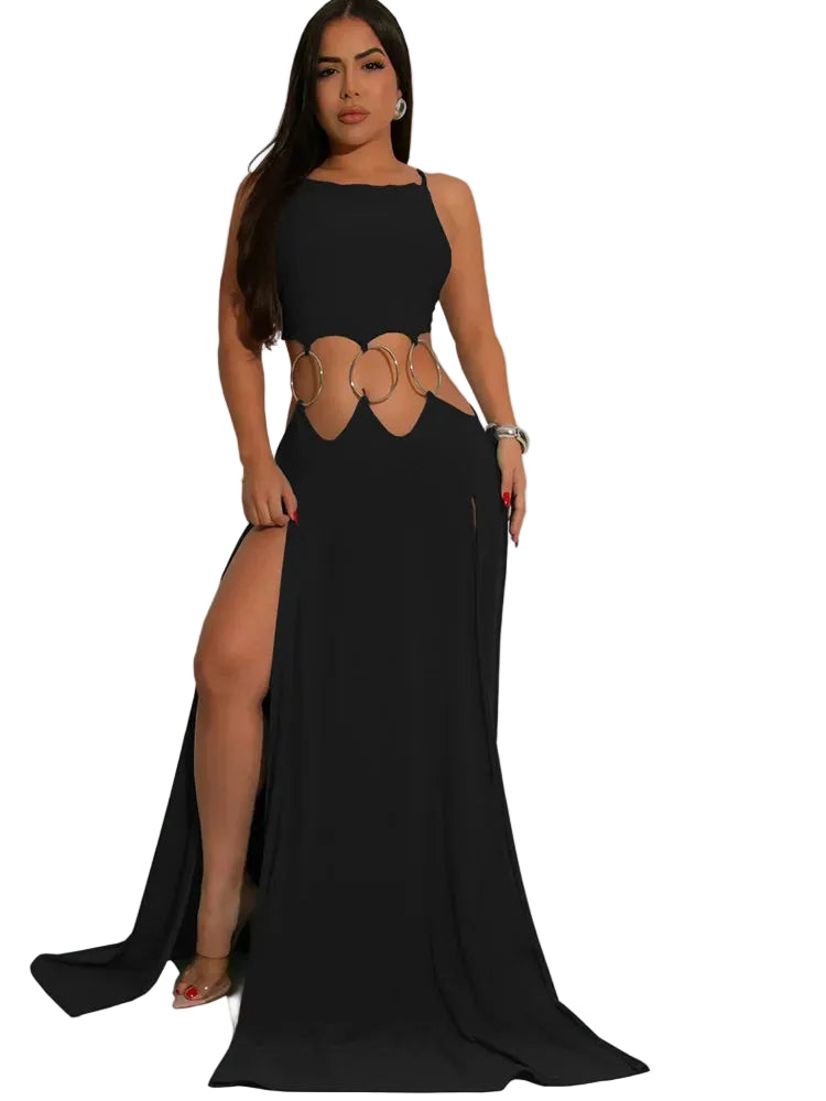 Woman wearing a black evening gown with a brown belt on a gray background