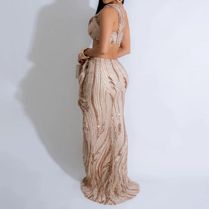 Woman wearing a beige and brown patterned outfit on a white background