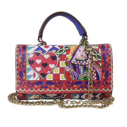 Colorful handbag with a Queen of Hearts design on a light gray background