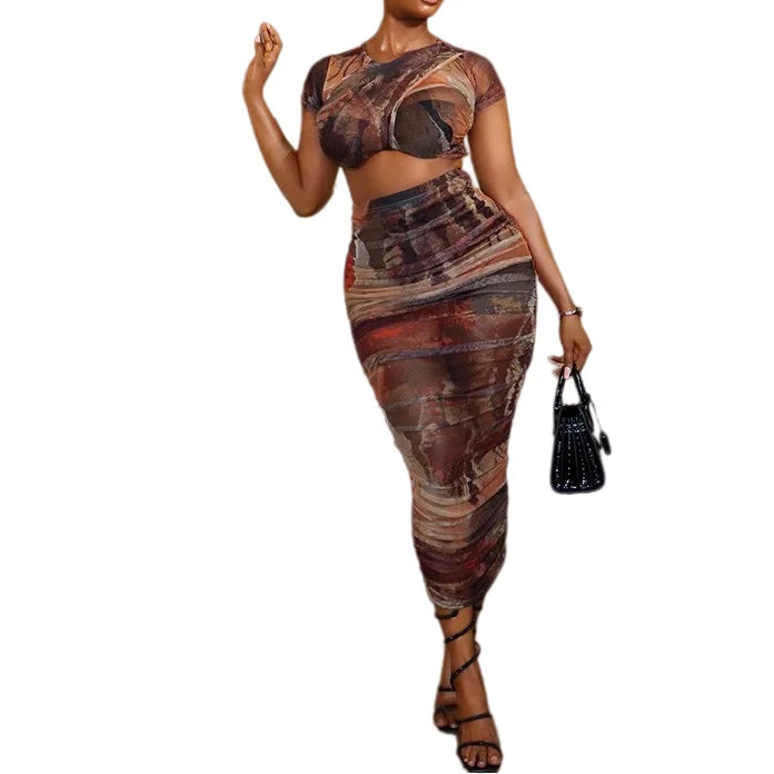 Woman wearing a patterned outfit on a white background