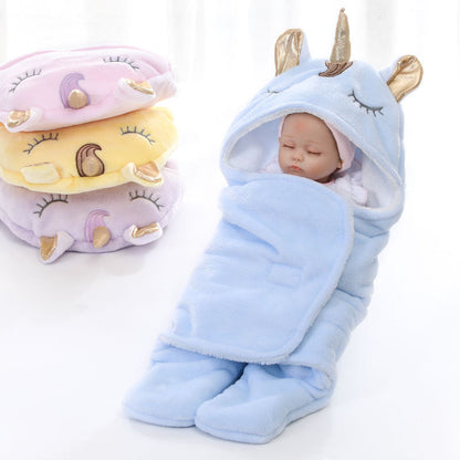Unicorn baby holding blanket