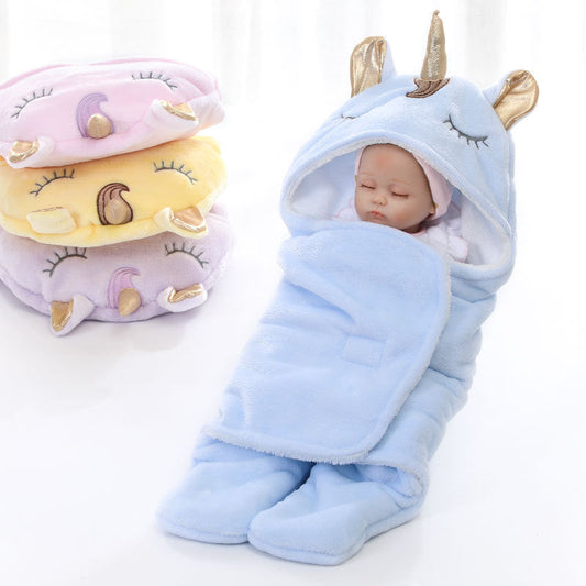 Unicorn baby holding blanket