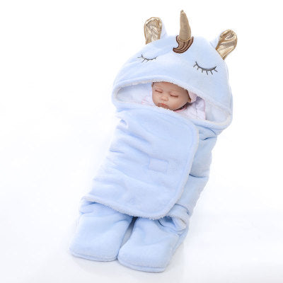 Unicorn baby holding blanket