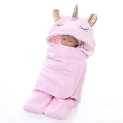 Unicorn baby holding blanket