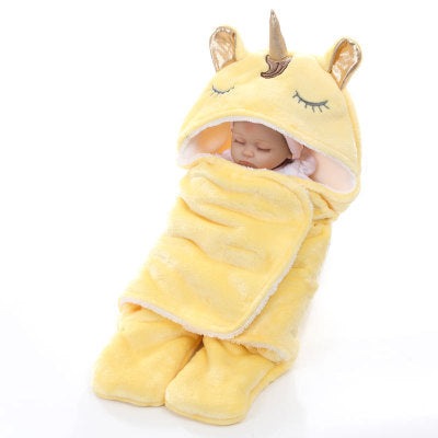 Unicorn baby holding blanket