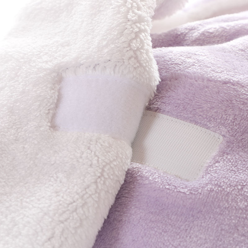 Unicorn baby holding blanket